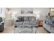 The living area offers comfortable seating and neutral tones, creating a relaxing atmosphere at 5855 Midnight Pass Rd # 319, Sarasota, FL 34242