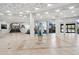 Expansive lobby with high ceilings, tiled floors, and elegant decor at 5855 Midnight Pass Rd # 319, Sarasota, FL 34242