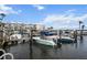 Picturesque marina with various boats docked, offering convenient water access for residents and visitors alike at 5855 Midnight Pass Rd # 319, Sarasota, FL 34242