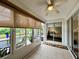 Sunroom with pool view and sliding glass doors at 1362 Hedgewood Cir, North Port, FL 34288