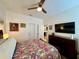 Spacious bedroom with large TV and closet at 1362 Hedgewood Cir, North Port, FL 34288