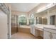 Bathroom features double sinks, garden tub and shower at 9115 Kingsbury Pl, Bradenton, FL 34212