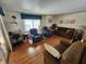 Living room with hardwood floors and ample seating at 5530 Denmark Dr, Bradenton, FL 34207