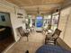 Relaxing sunroom with tiled floor and plenty of natural light at 5530 Denmark Dr, Bradenton, FL 34207