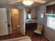 Bedroom with ensuite bathroom and sitting area at 5530 Denmark Dr, Bradenton, FL 34207