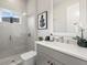 Modern bathroom with a walk-in shower and gray vanity at 729 Tailwind Pl, Sarasota, FL 34240