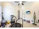 Well-lit exercise room featuring workout equipment and neutral-colored walls and flooring at 3342 Founders Club Dr, Sarasota, FL 34240
