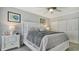 Main bedroom with ceiling fan and plenty of closet space at 4380 Exeter Dr # 303, Longboat Key, FL 34228