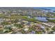 Wide shot of the neighborhood and waterfront at 4440 Yacht Club Dr, Venice, FL 34293