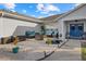 Inviting front porch with seating area and small water feature at 5819 2Nd Avenue Nw Dr, Bradenton, FL 34209