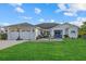 Cute single-story home with attached garage and nicely landscaped yard at 5819 2Nd Avenue Nw Dr, Bradenton, FL 34209