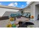 Relaxing patio with fire pit and water feature at 5819 2Nd Avenue Nw Dr, Bradenton, FL 34209