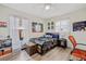 Bright bedroom with double bed, window, and wood-look flooring at 5819 2Nd Avenue Nw Dr, Bradenton, FL 34209