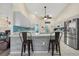 Modern kitchen with stainless steel appliances and breakfast bar at 5819 2Nd Avenue Nw Dr, Bradenton, FL 34209