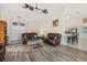 Bright living room with leather sofas and hardwood floors at 5819 2Nd Avenue Nw Dr, Bradenton, FL 34209