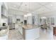 Large kitchen with an island, stainless steel appliances, and breakfast area at 3342 Founders Club Dr, Sarasota, FL 34240
