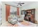 Bright home office features built-in desk, comfortable seating, and large window at 3342 Founders Club Dr, Sarasota, FL 34240