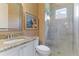 Bathroom boasts a large walk-in shower, granite countertop, and updated fixtures at 3342 Founders Club Dr, Sarasota, FL 34240