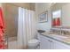 Clean bathroom with shower/tub combo, granite countertop, and updated fixtures at 3342 Founders Club Dr, Sarasota, FL 34240