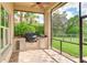 Outdoor kitchen with grill, sink, and stainless steel appliances at 3342 Founders Club Dr, Sarasota, FL 34240