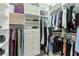 Large walk-in closet with custom shelving and ample storage at 3342 Founders Club Dr, Sarasota, FL 34240