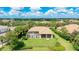 Home with pool and fenced backyard, overlooking a golf course at 3342 Founders Club Dr, Sarasota, FL 34240