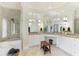 Spa-like Primary bathroom with a large walk-in shower and double vanities at 3342 Founders Club Dr, Sarasota, FL 34240
