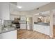 Modern kitchen with stainless steel appliances and granite countertops at 1712 Starling Dr # 101, Sarasota, FL 34231