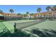 Two well-maintained tennis courts at 4380 Exeter Dr # 303, Longboat Key, FL 34228