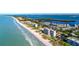 Aerial view of community with beach and oceanfront access at 4380 Exeter Dr # 303, Longboat Key, FL 34228