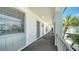 Clean and well-lit hallway with apartment access at 4380 Exeter Dr # 303, Longboat Key, FL 34228