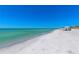 Beautiful white sand beach with clear water at 4380 Exeter Dr # 303, Longboat Key, FL 34228