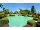 Community putting green with landscaping at 4380 Exeter Dr # 303, Longboat Key, FL 34228