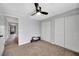 Well-lit bedroom with double closets and a view of the hallway at 5314 36Th Avenue W Cir # F9, Bradenton, FL 34209