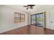 Bedroom with a door leading to a screened pool area at 14636 Newtonmore Ln, Lakewood Ranch, FL 34202