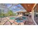 Stunning screened-in pool and spa featuring plenty of room for entertaining and relaxation at 14636 Newtonmore Ln, Lakewood Ranch, FL 34202