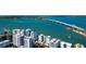 Waterfront condos featuring serene bay views and modern architecture, perfect for luxurious coastal living at 226 Golden Gate Pt # 64, Sarasota, FL 34236