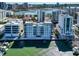 Aerial view of a waterfront condo community with direct access to the bay at 226 Golden Gate Pt # 64, Sarasota, FL 34236