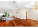 Elegant dining room with hardwood floors and a chandelier at 7565 Palmer Glen Cir, Sarasota, FL 34240