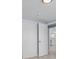 Hallway with doors to bedrooms and kitchen at 6912 Kenwood Dr, North Port, FL 34287