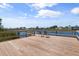 Spacious wooden dock perfect for relaxing by the water at 6912 Kenwood Dr, North Port, FL 34287