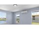 Spacious bedroom with multiple windows and water views at 6912 Kenwood Dr, North Port, FL 34287