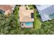 Bird's eye view of house with pool and lush surroundings at 3432 Highlands Bridge Rd, Sarasota, FL 34235