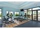 Modern fitness center featuring treadmills and elliptical machines at 14636 Newtonmore Ln, Lakewood Ranch, FL 34202