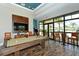 Game room with a pool table and arcade games at 14636 Newtonmore Ln, Lakewood Ranch, FL 34202