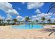 Resort-style pool with palm trees and a fun water feature for  at 14636 Newtonmore Ln, Lakewood Ranch, FL 34202