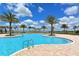 Relaxing freeform pool with a spacious deck at 14636 Newtonmore Ln, Lakewood Ranch, FL 34202