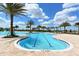 Lapped pool with a separate play area for children at 14636 Newtonmore Ln, Lakewood Ranch, FL 34202