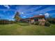 Peaceful backyard oasis with screened patio and lake view at 14636 Newtonmore Ln, Lakewood Ranch, FL 34202