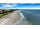 Aerial view of beach and ocean, showcasing the property's prime location at 1903 Bayshore Dr, Belleair Beach, FL 33786